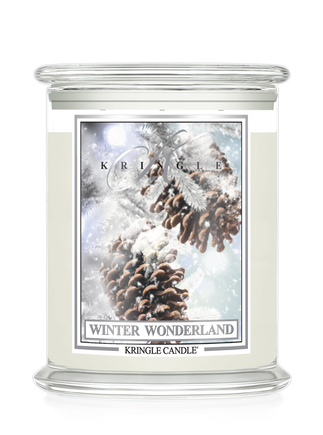Kringle Candle Winter Wonderland candle with a snowy pine cone design on a white background